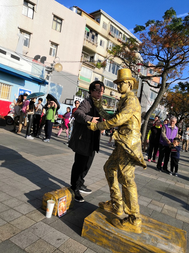 Street performers at Tamsui Passenger Wharf.